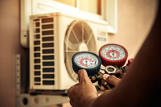 Professional Air Conditioning Service technician working in Union, OR